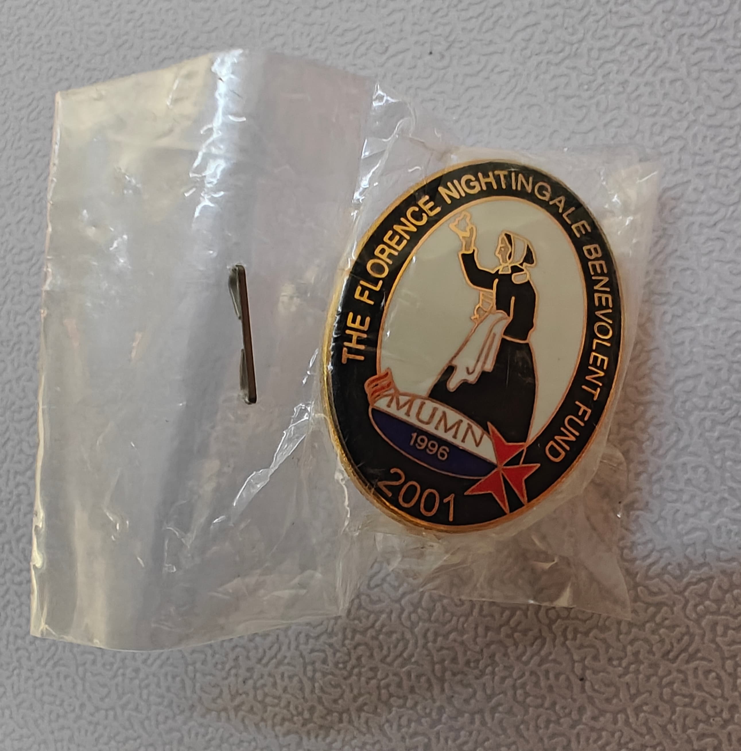 The Florence Nightingale Benevolent Fund 1996 - 2001 Enamel Pin Badge
